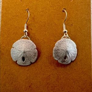 Gorgeous silver color sand dollar earrings